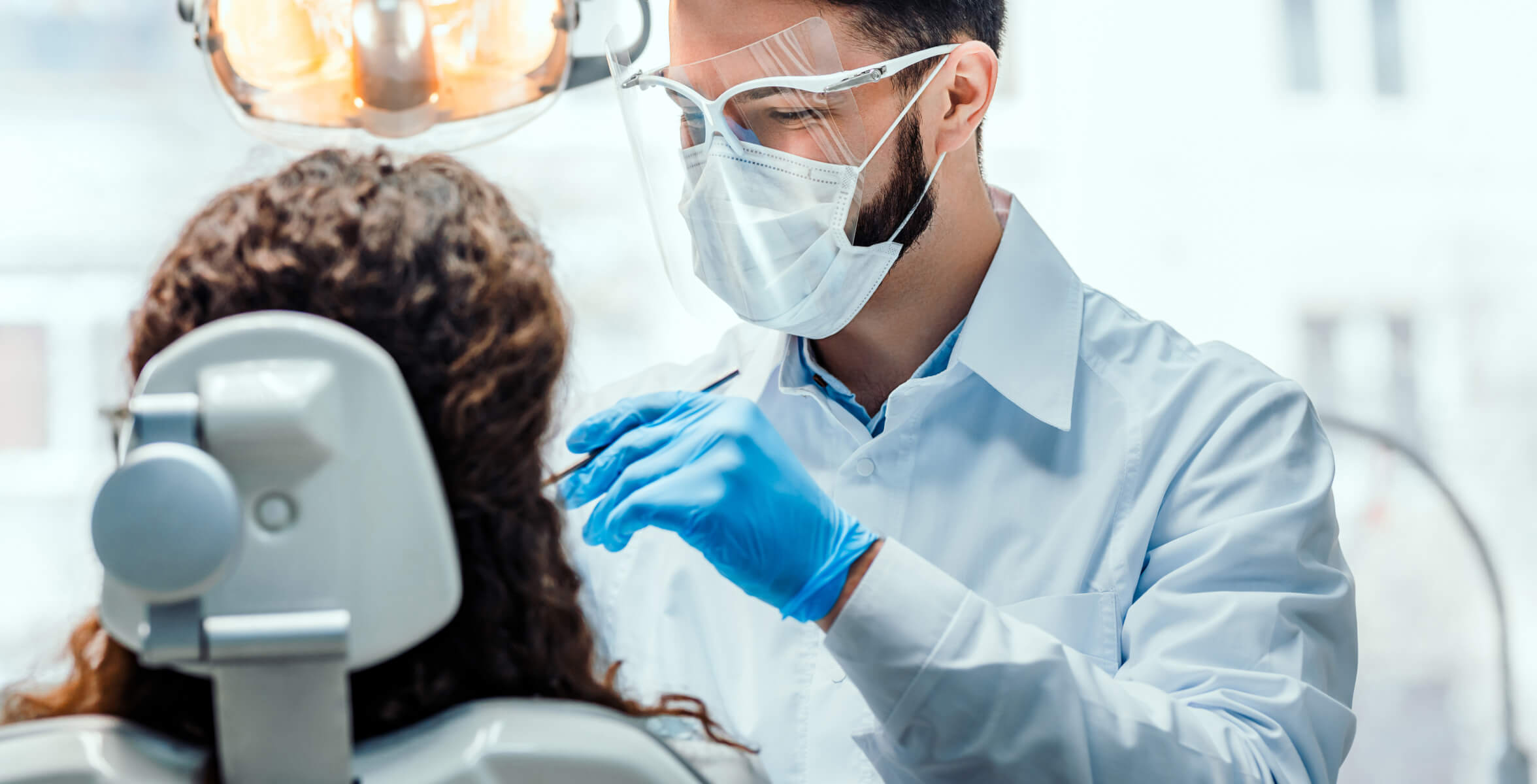 image of dentist checking up